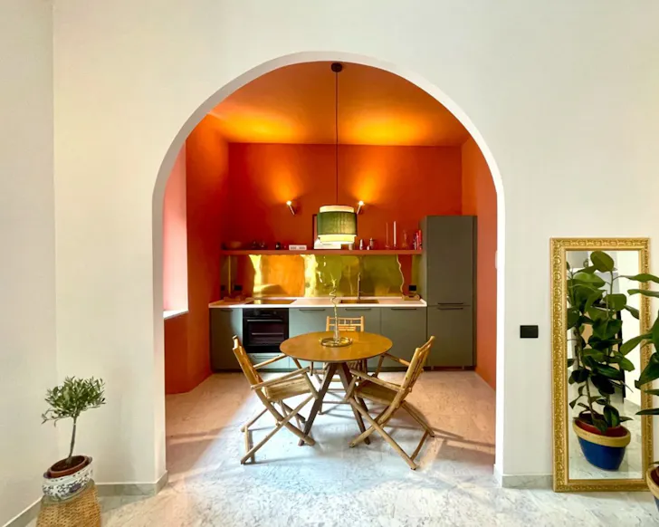 The archway to the kitchen at Milan Flat With A Boho Touch best Milan Airbnbs