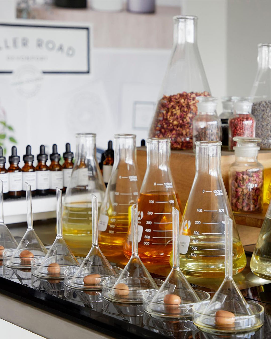 A line up of fragrances ready to be mixed at Miller Road Fragrances.
