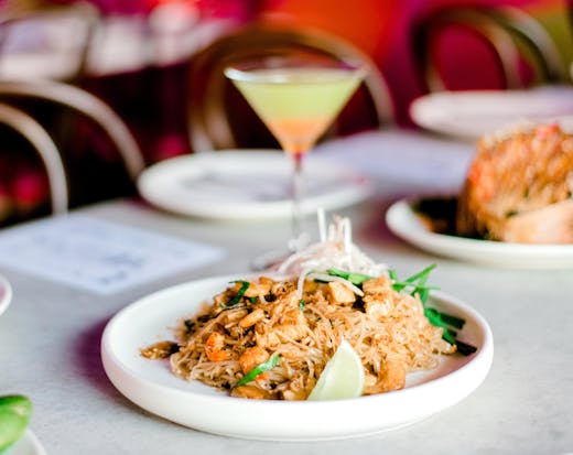 A plate of South-East Asian food on a table at a restaurant on the Gold Coast.