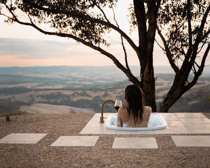 The outdoor bath with a view at Mist @ Nest and Nature Retreat one of the best tiny homes South Australia