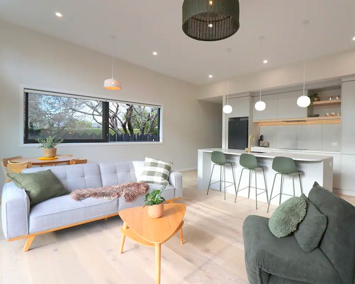 The cosy living room and kitchen at Mod Box.