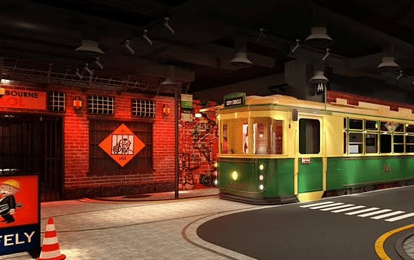 The inside of a theme park with a jail and a tram.