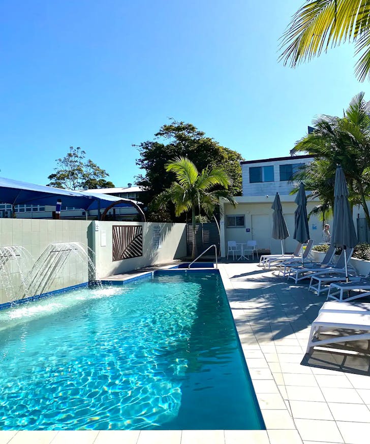a mooloolaba airbnb with a pool