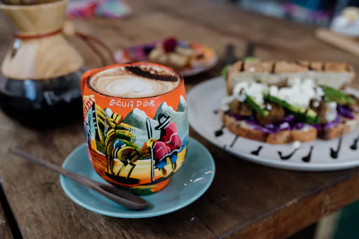 a colourful cup that says 'ecuador'