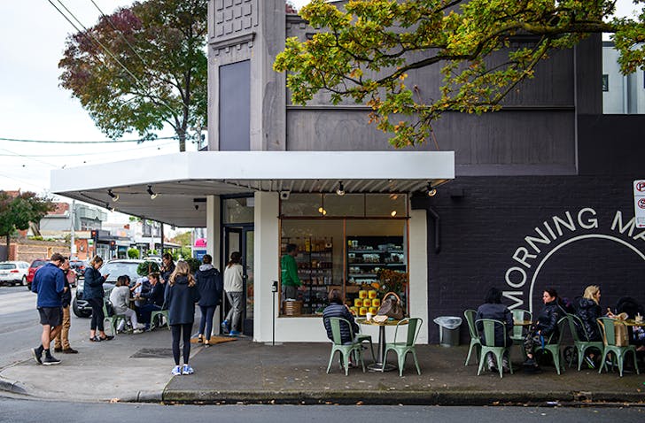 The exterior of the store, on a corner with a busy line