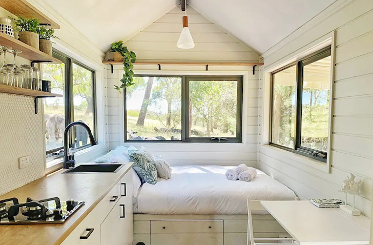 A view of the bedroom and kitchen area at the tiny home in Victoria