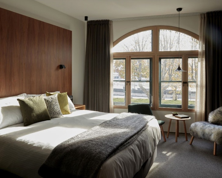 A bedroom overlooking Salamanca Place at Moss Hotel one of the best Hobart hotels