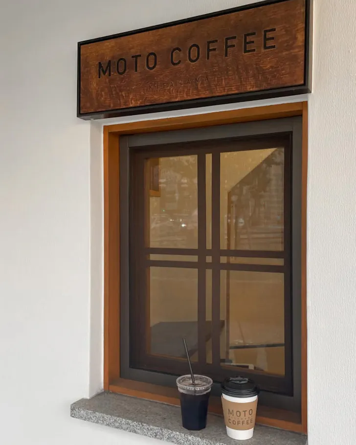 The timber takeaway window at MOTO Coffee in Osaka.