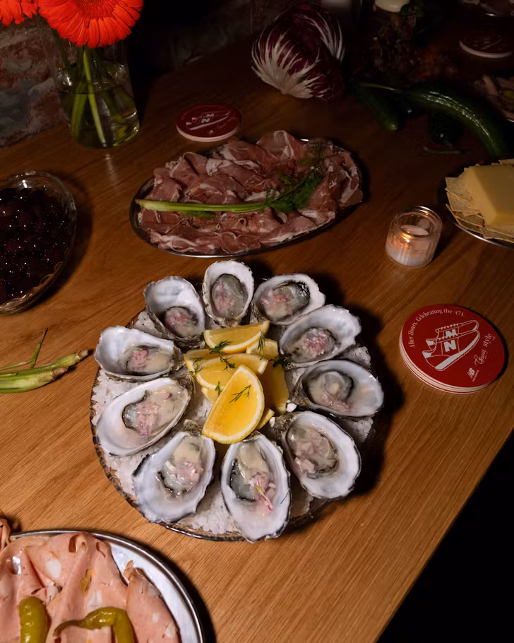 Food on table with flowers.