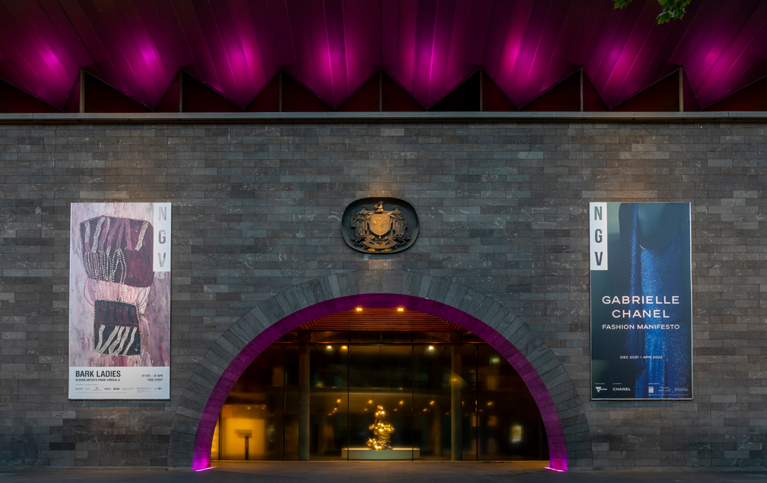 The exterior of the NGV with lights on.