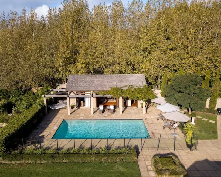 The pool and property from above at NZ Summer House one of the best romantic stays near Auckland