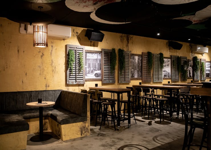 the vietnam-inspired interior of a bar