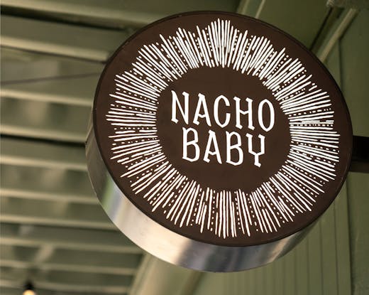 a sign at a tequila bar