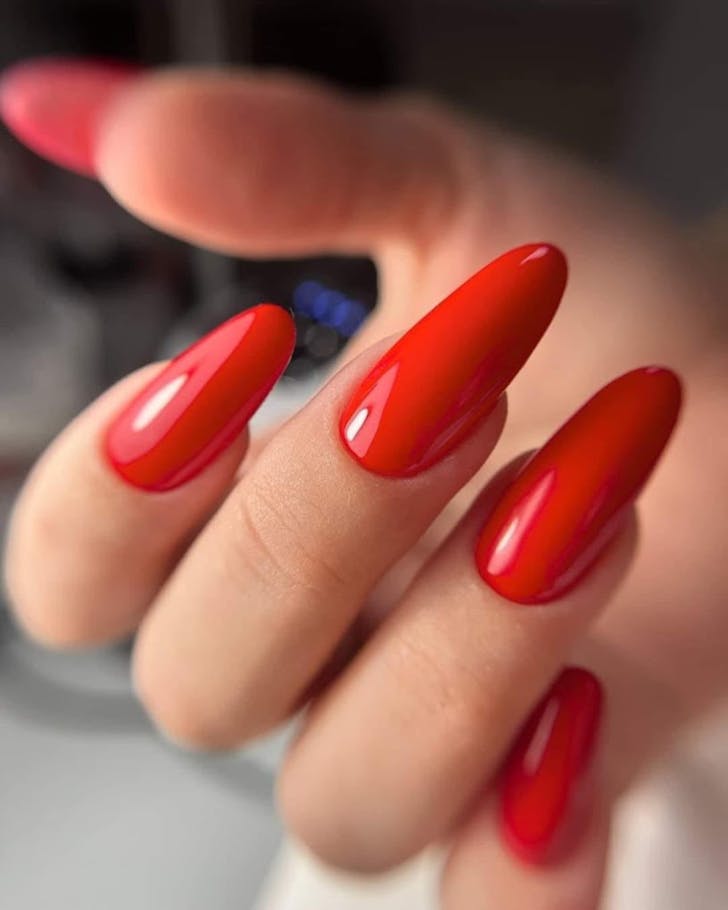 Flawless red nails by Nails Love Auckland. 