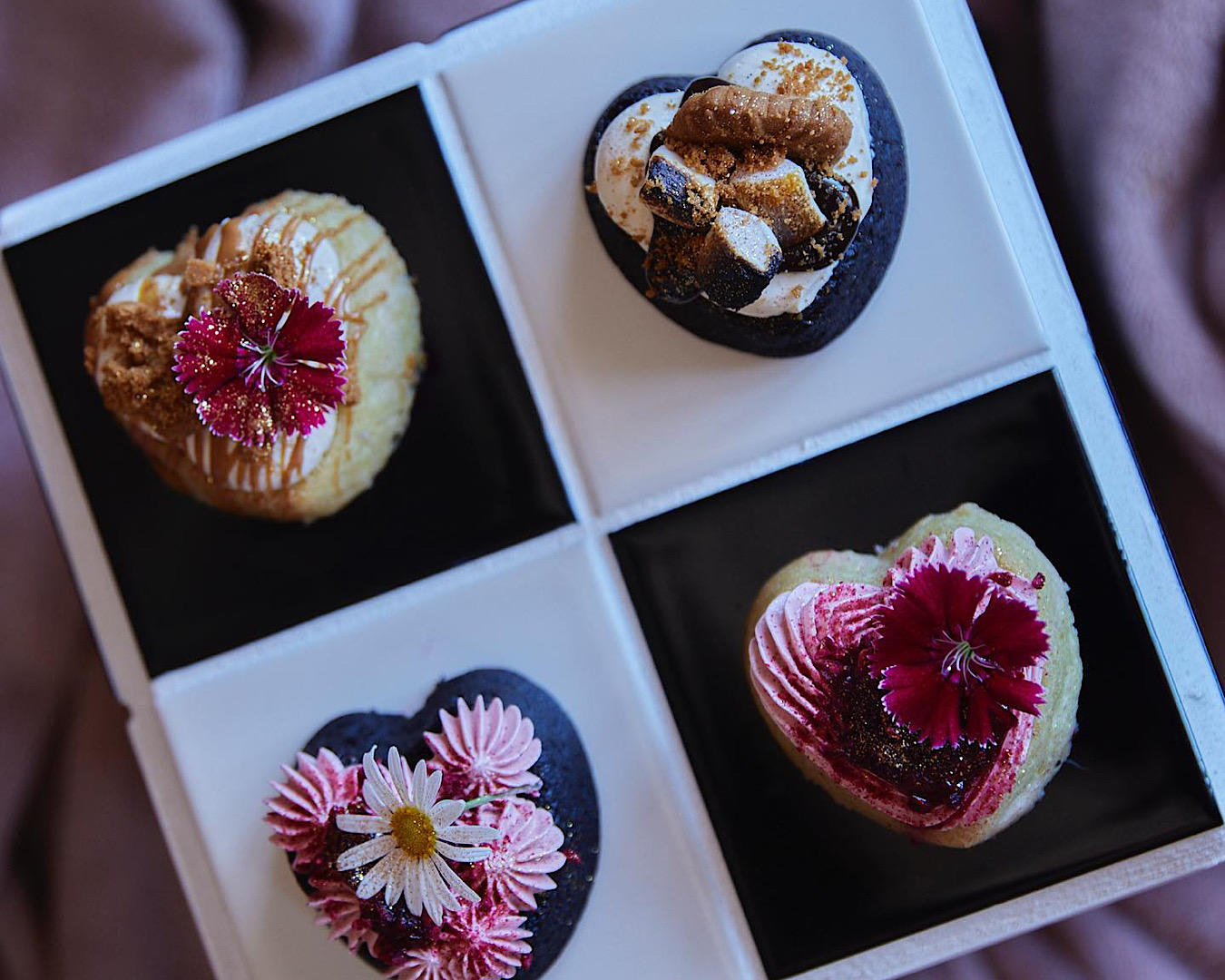An array of tiny loved up Valentine’s Day cakes by Neat. 