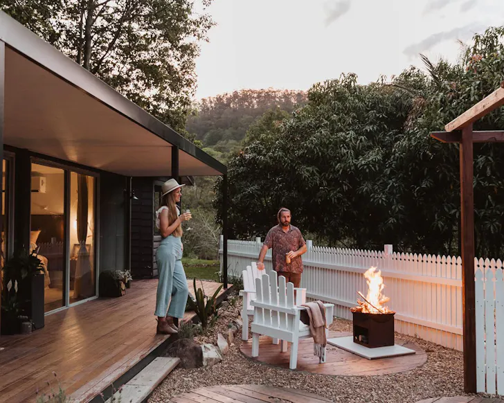 The outdoor fire pit at Neranwoods Hillside Cabin & Sauna best winter cabins near Brisbane