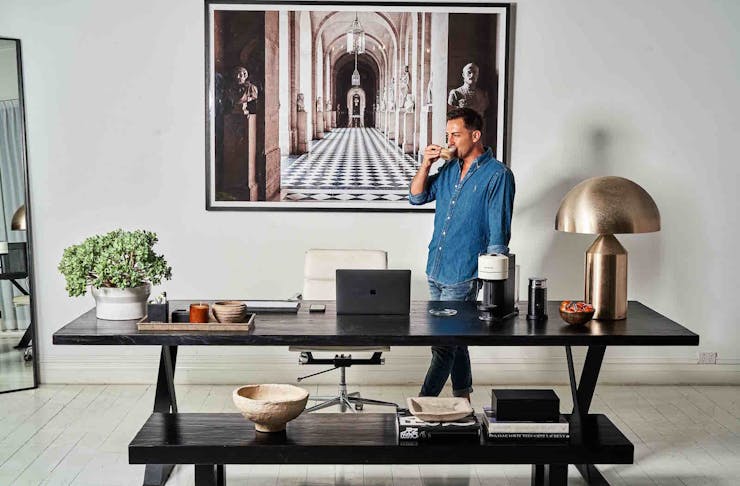 Stylist Steve Cordony stands in his stunning home office.