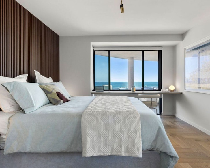 The bedroom with a sea view at Neue Blue one of the best Perth Airbnbs