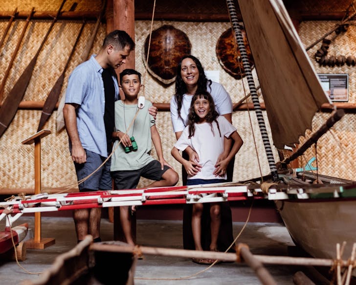 A family in one of the galleries at the New Zealand Maritime Museum. 