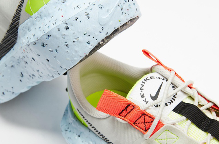 A pair of colourful Nike shoes with a speckled sole. 