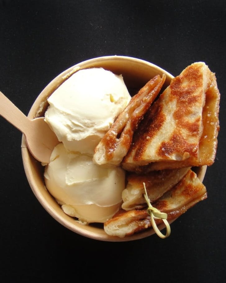 Cinnamon sugar pancake in a bowl with ice cream.
