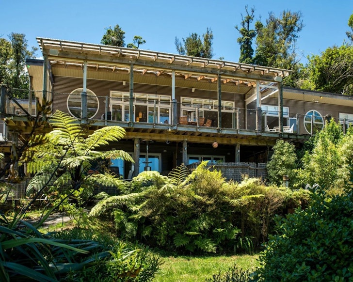 An exterior view of No Road Inn best NZ beach house Airbnbs