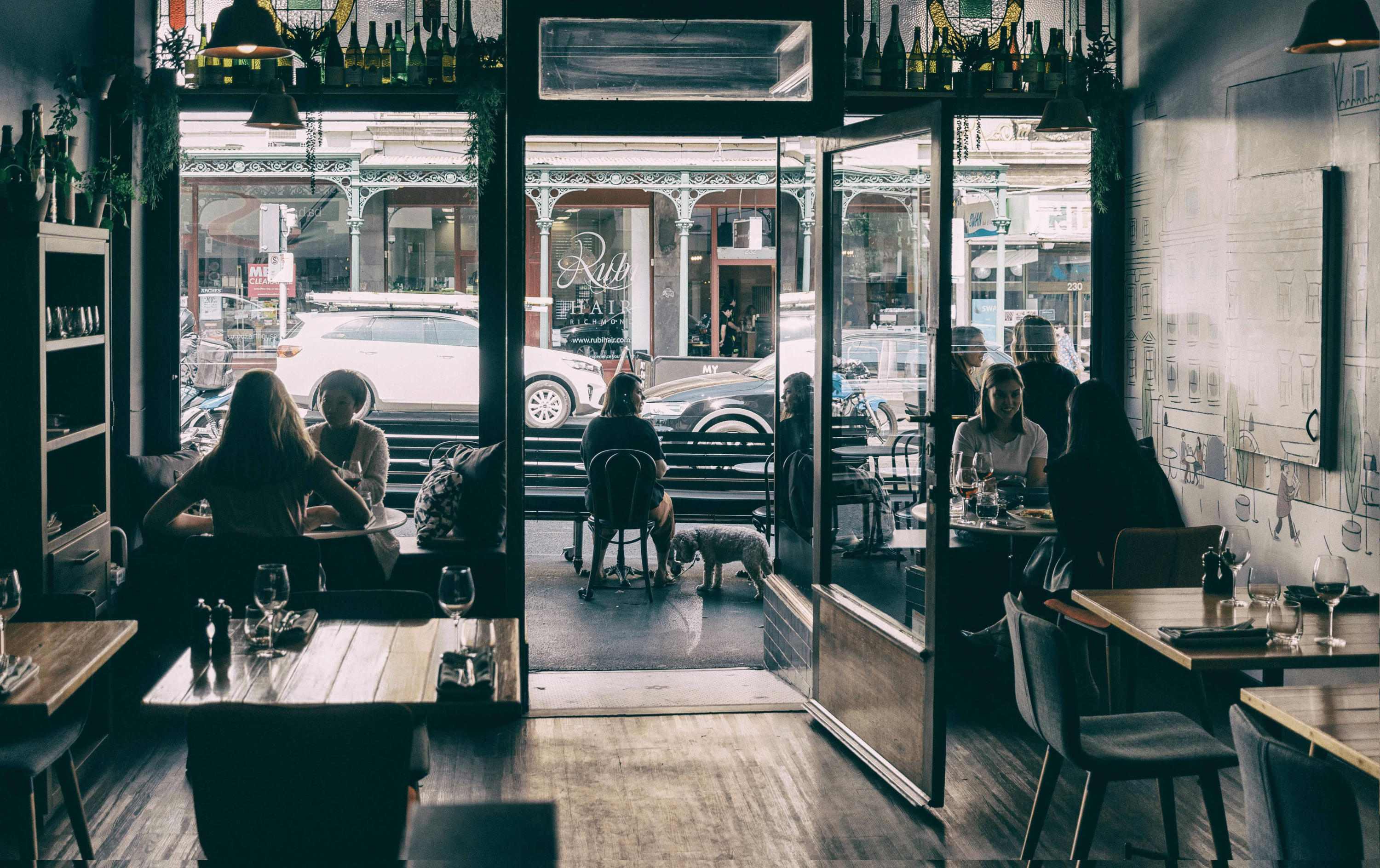 The inside of one of the best restaurant Richmond has with wine bottles lining the wall.