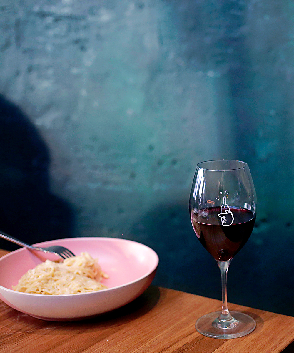 Red wine in a glass and pasta at Northbirdge Wine Room