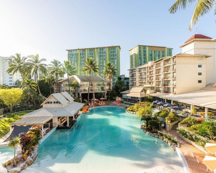 A view of the hotel and pool at Novotel Cairns Oasis Resort one of the best hotels in Cairns