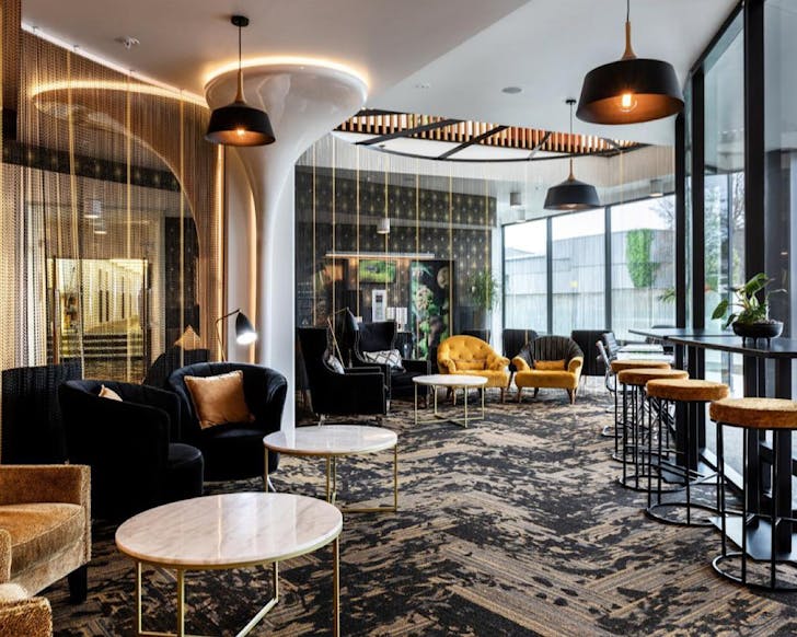 A large plush seating area at Novotel New Plymouth, one of the best hotels in New Plymouth. 