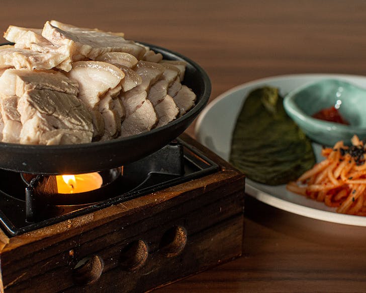 A delicious dish at Ockhee over a tea light candleâone of the tastiest Ponsonby restaurants in town