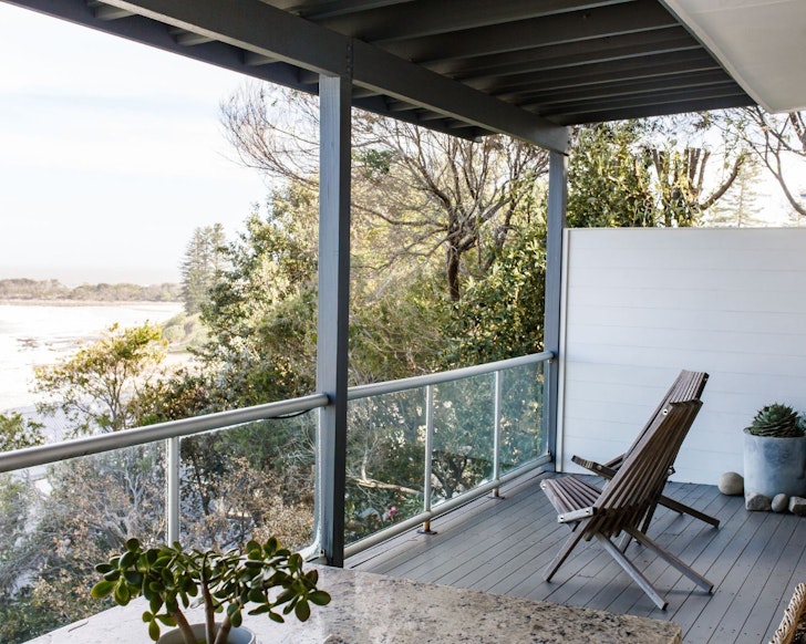 A view from the deck to the sea at Oceanfront Apartment one of the best Yamba Airbnbs