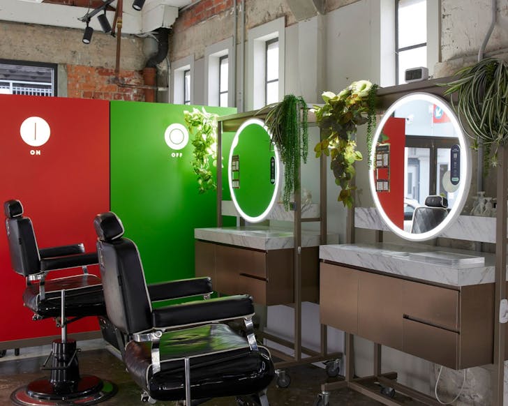 A pretty loft salon with a reclining barber chair