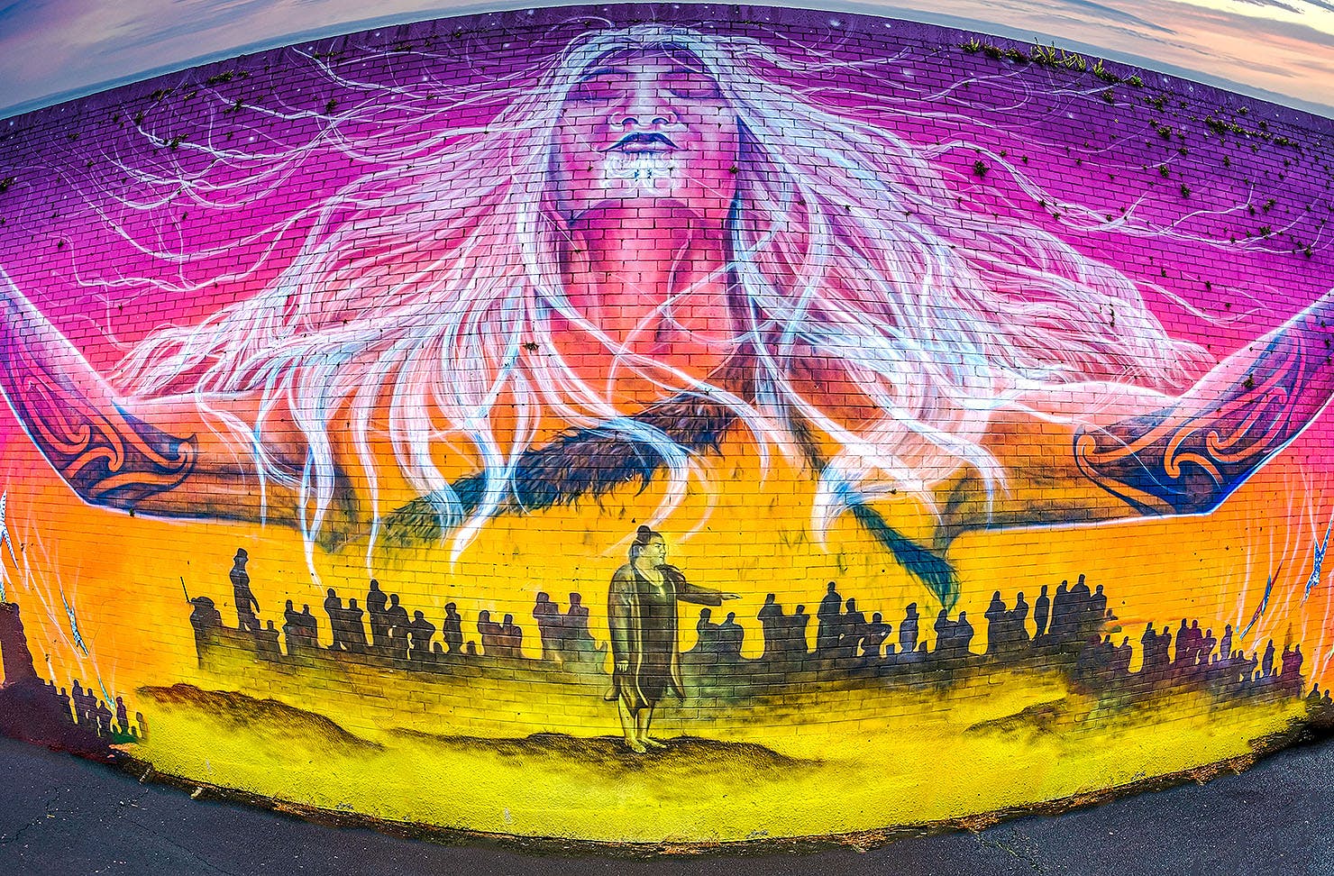 Impressive street art adorns a wall in Onehunga.