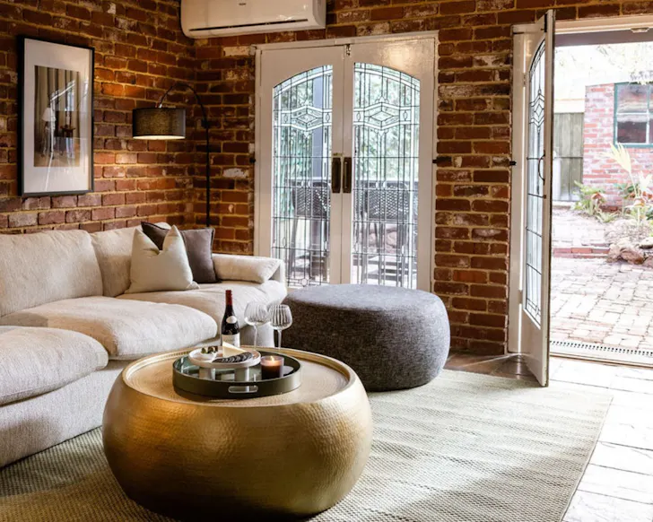 The lounge and backyard at Orange Avenue best Perth Airbnbs