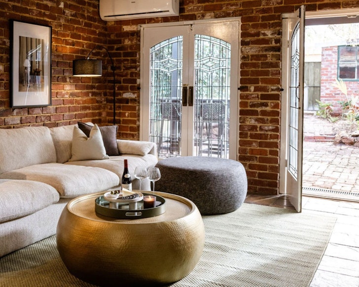 The lounge and backyard at Orange Avenue best Perth Airbnbs