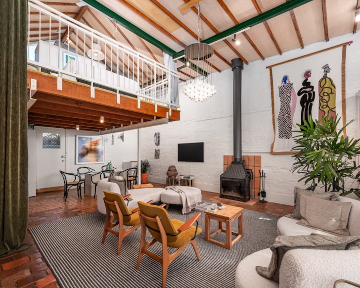 The living space at Original Fitzroy Artist’s Loft one of the best Melbourne Airbnbs