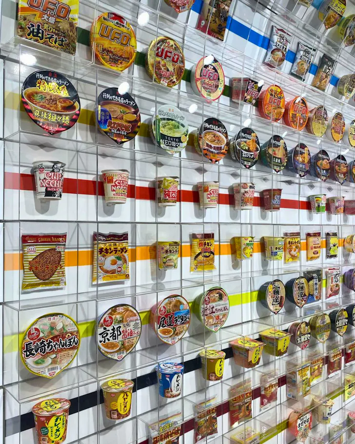 A wall of instant ramen noodle packages at this quirky museum in Osaka. 