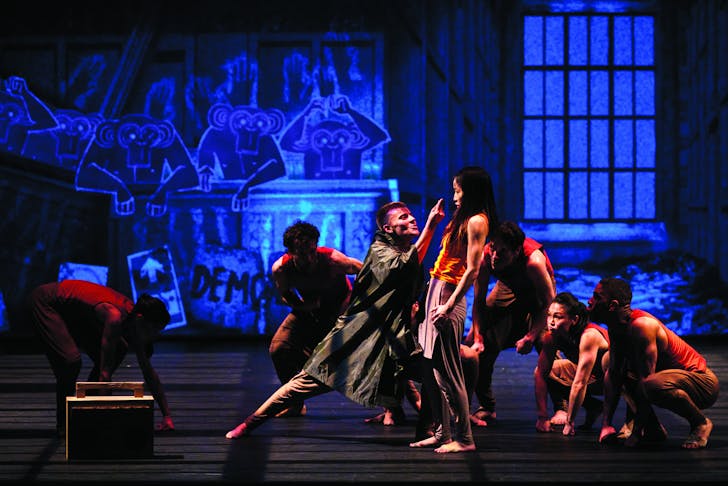 People dancing on stage.