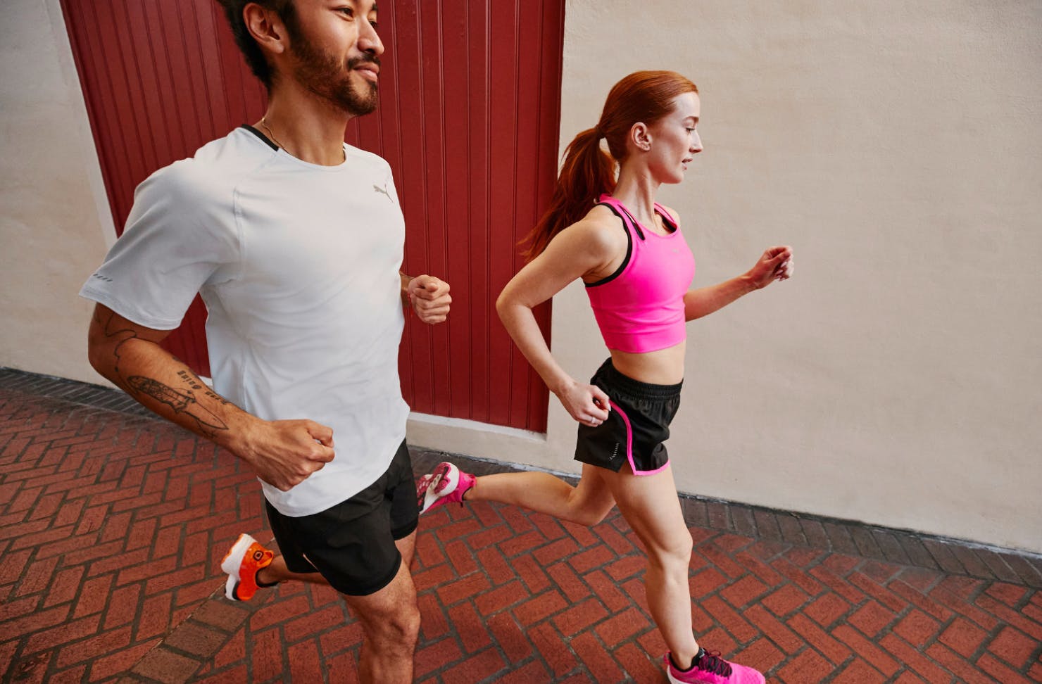 Two people running