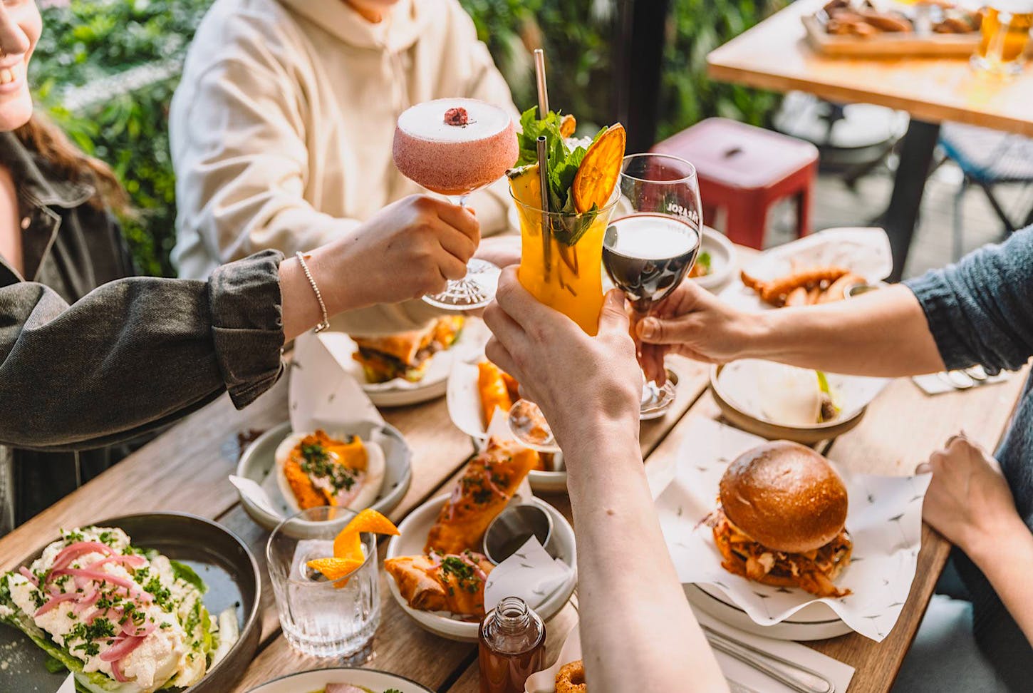 A group toast Parasol & Swing as one of the best bars in Auckland. 