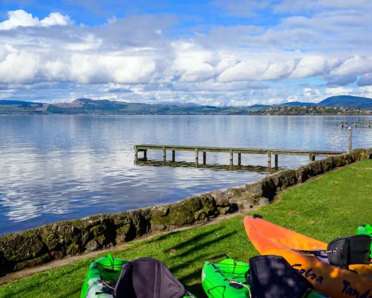 kayaks by the water at Parawai Lakehouse Sanctuary best family friendly accommodation New Zealand