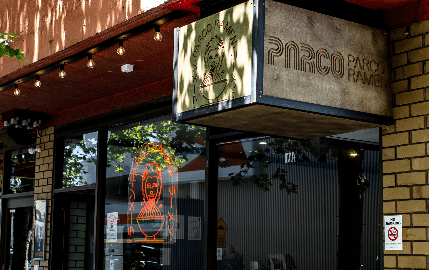 The outside of a Japanese Restaurant Moonee Ponds with a neon sign.