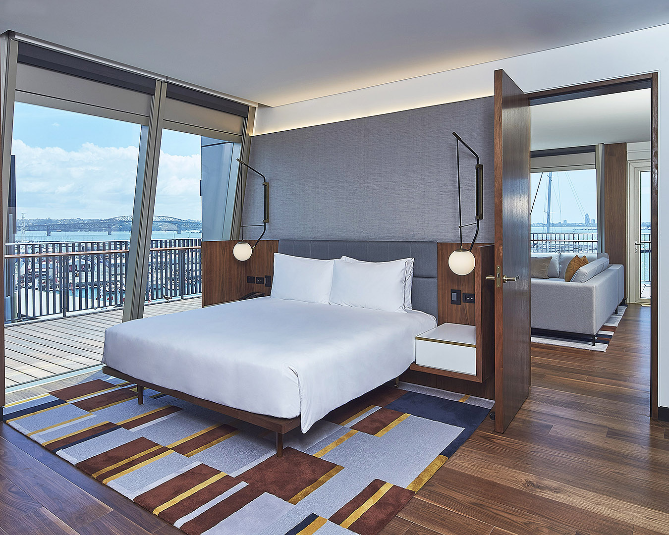 The executive room suite at Park Hyatt shows a bed with amazing views.