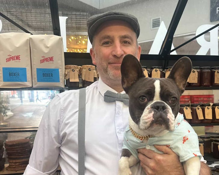 Pastrami & Rye owner, Dave, with his pooch Frank.