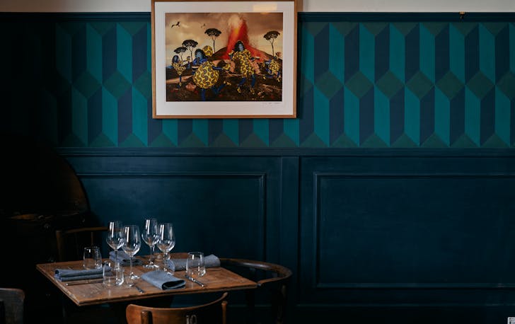 A corner of a rining room with a coloured-patterned wall, Melbourne Christmas party venue.
