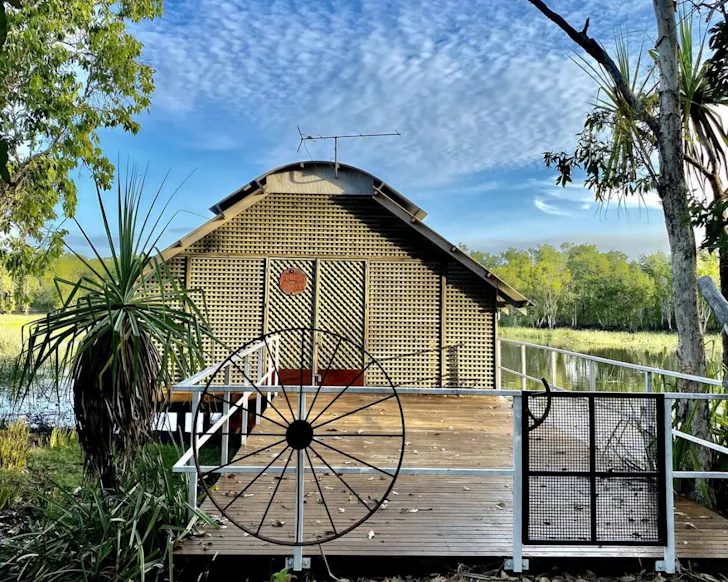 An exterior view of the rustic Pelican Lagoon one of the best Darwin Airbnbs