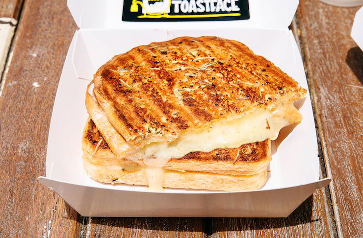 Toastface Grillah's grilled cheese sandwich in a cardboard package