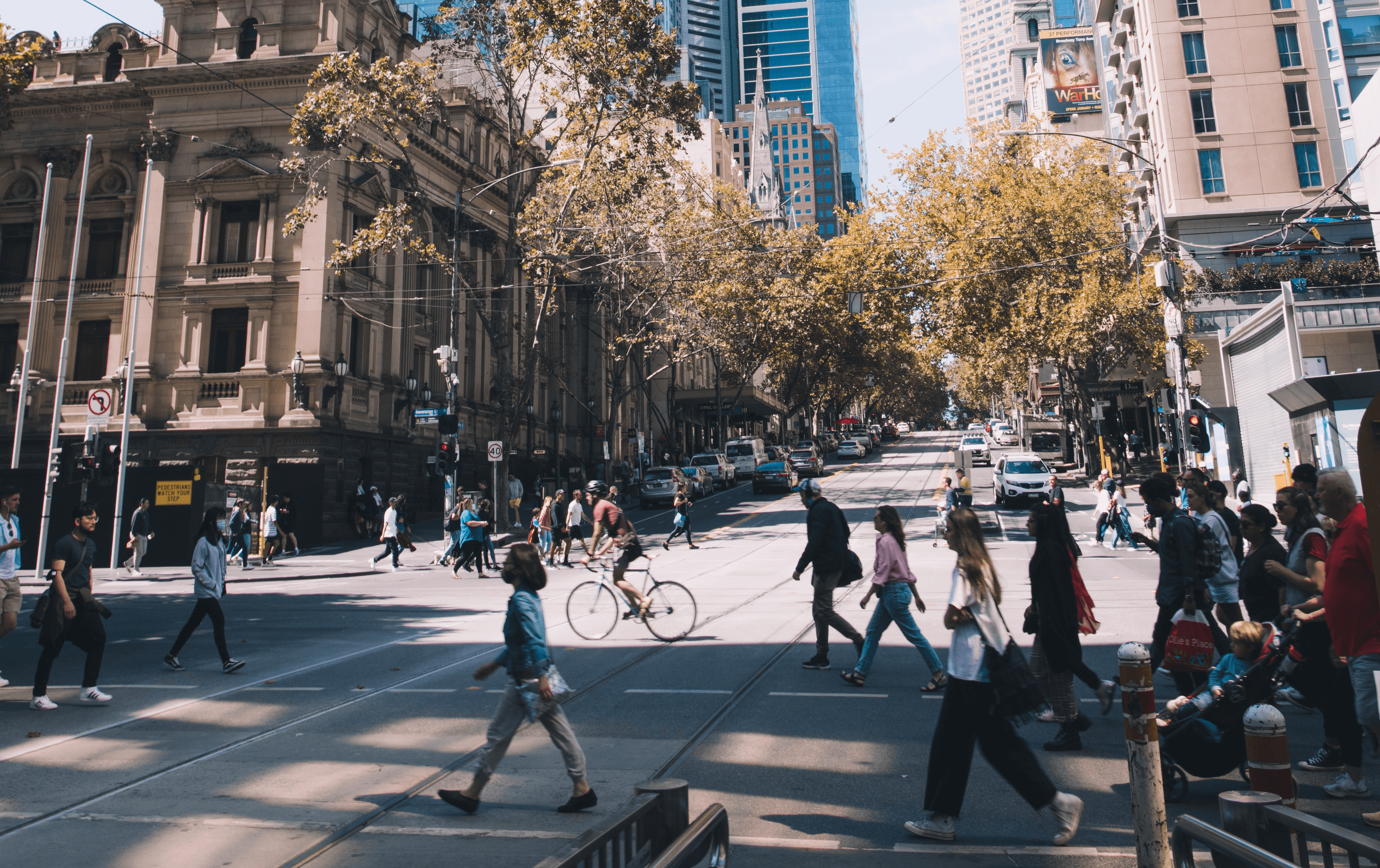 The CBD with people walking across a street.