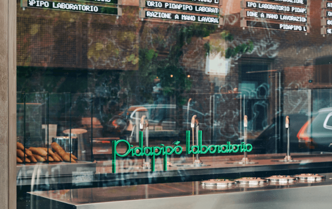 The shopfront of one of the best ice cream and gelato shops in Melbourne with a green logo.